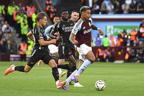 Premier League 2024-25: Arsenal's Leandro Trossard, left, challenges for the ball with Aston Villa's Morgan Rogers